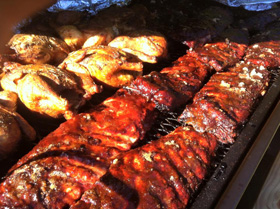 Chicken and bbq ribs on the grill