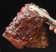 BBQ Ribs on tongs